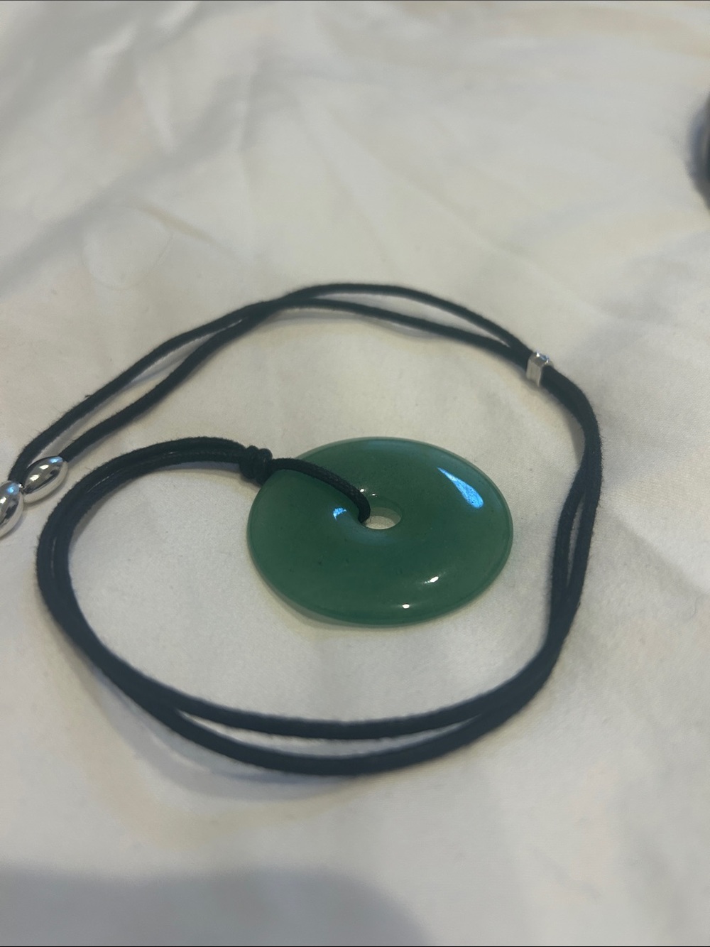 Ben-Amun Green Jade Donut Pendant Necklace with Black Cord
